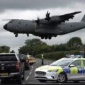Military police block London road for large plane ✈️
