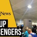 Passengers at Manchester Airport climb through carousel in bid to retrieve luggage