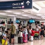 Long queue at Sydney Airport terminal an 'unmitigated embarrassment'