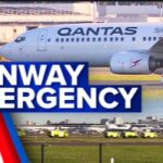 Flames reported coming from Qantas plane before take-off | 9 News Australia
